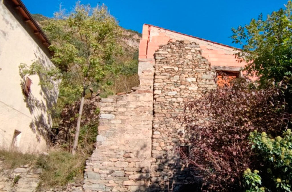 Terreno con edificación